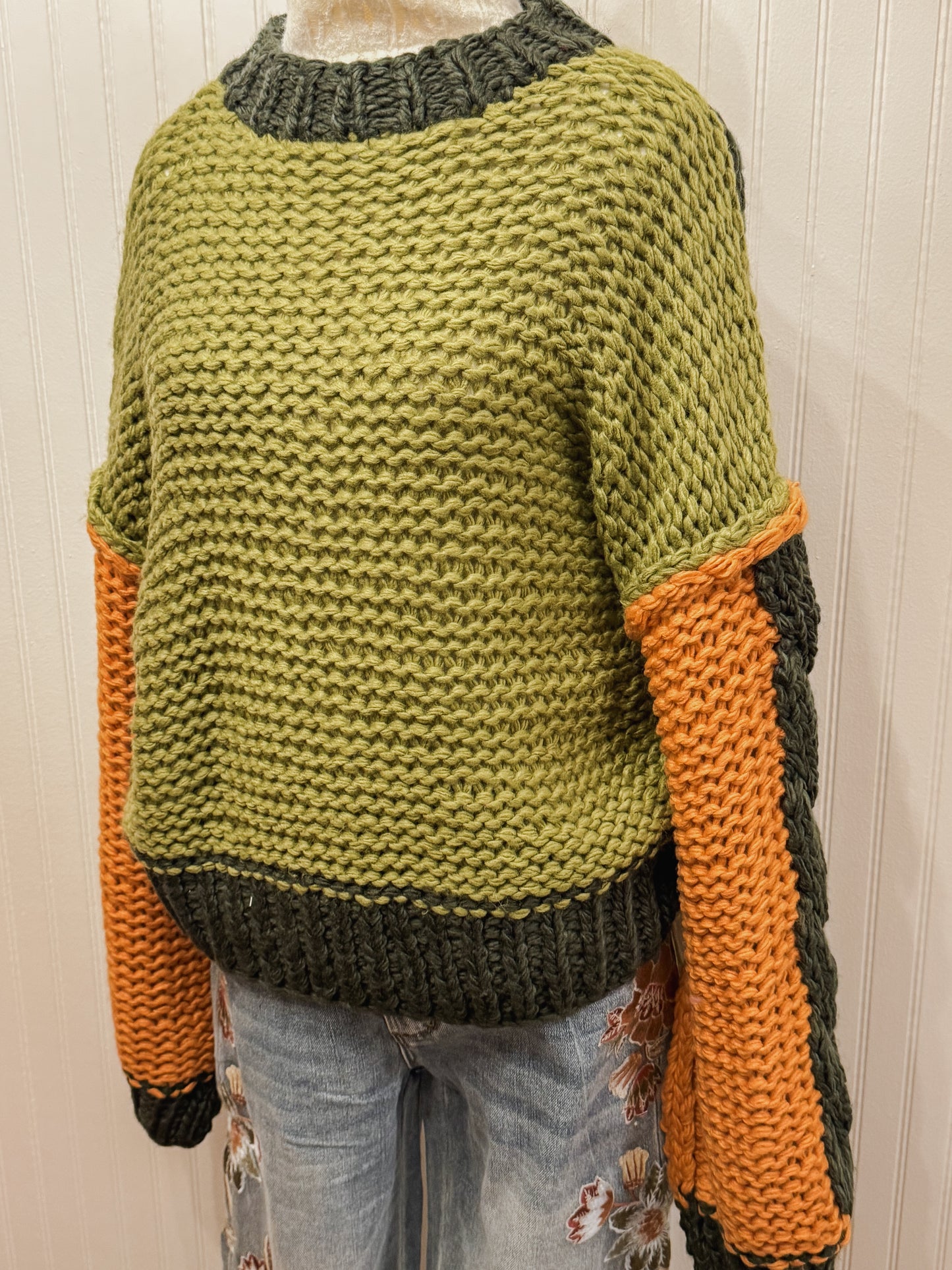 Hand knit color block chunky pullover sweater.