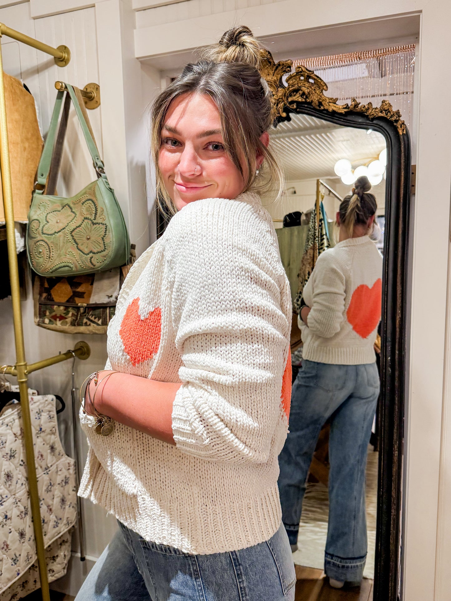 Collared heart V-neck pocket knit cardigan.