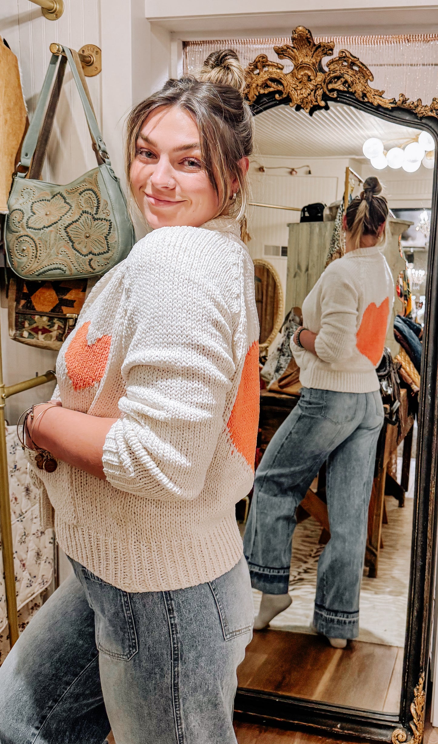Collared heart V-neck pocket knit cardigan.