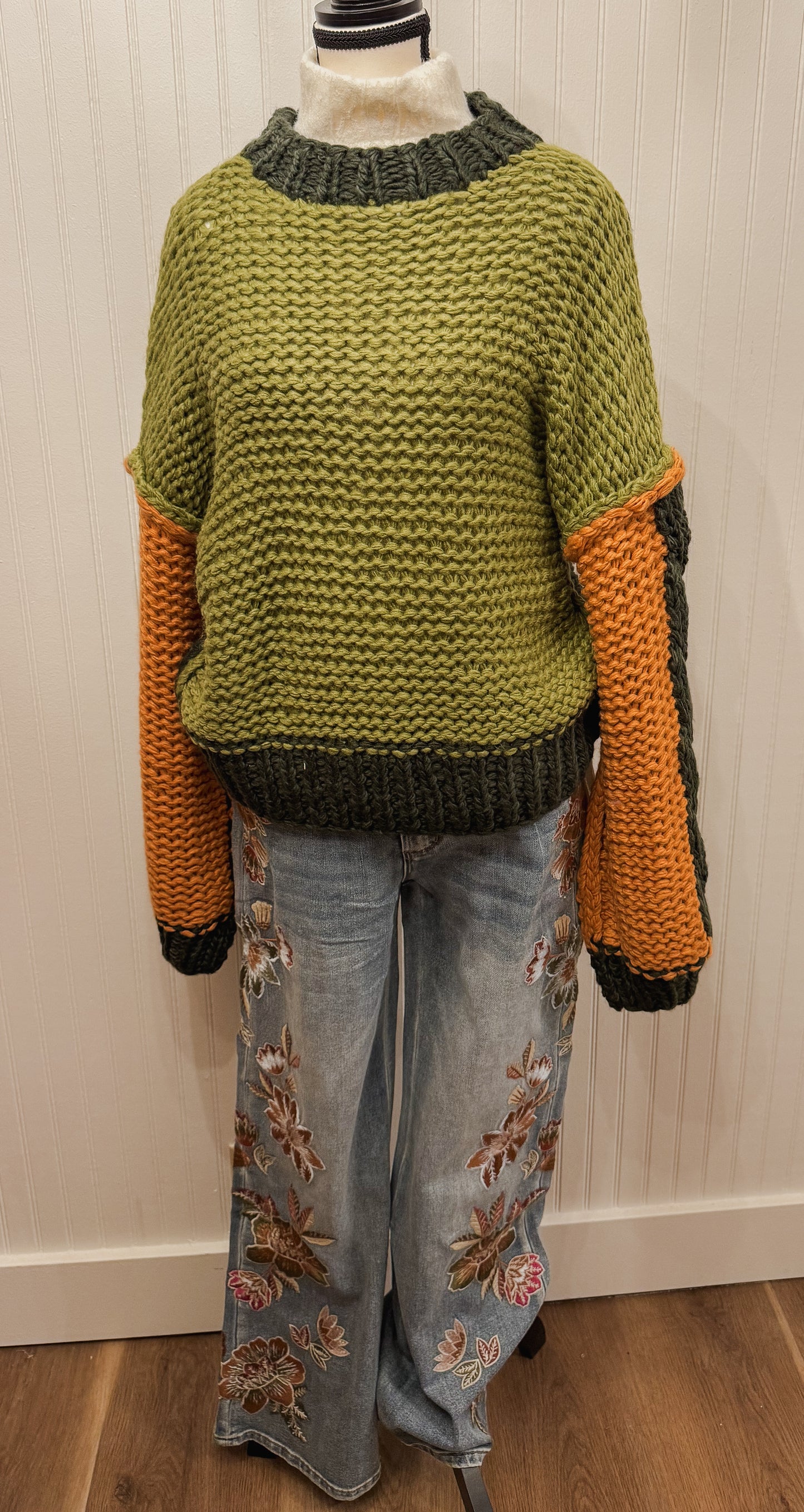 Hand knit color block chunky pullover sweater.