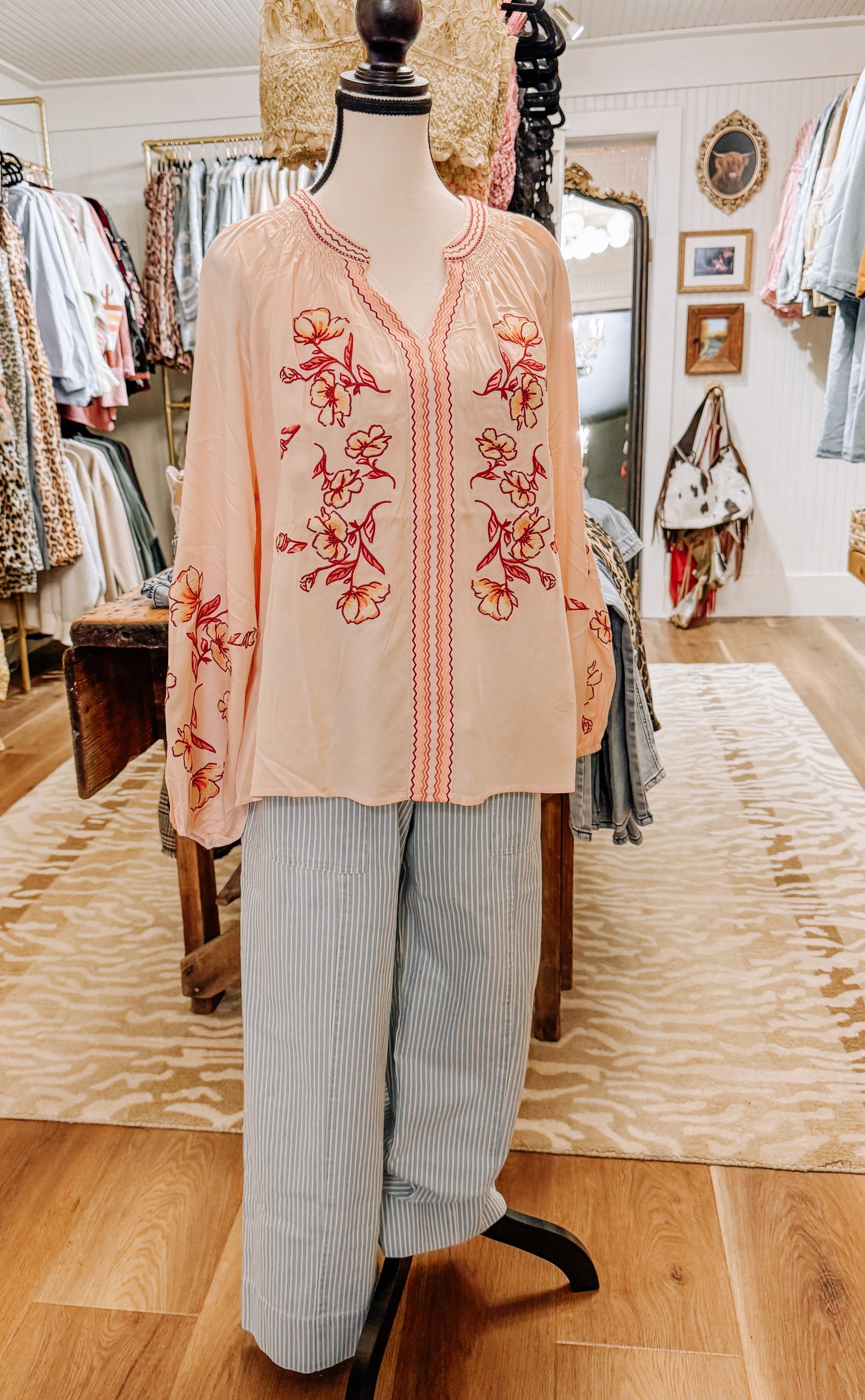 Peachy pink floral blouse.