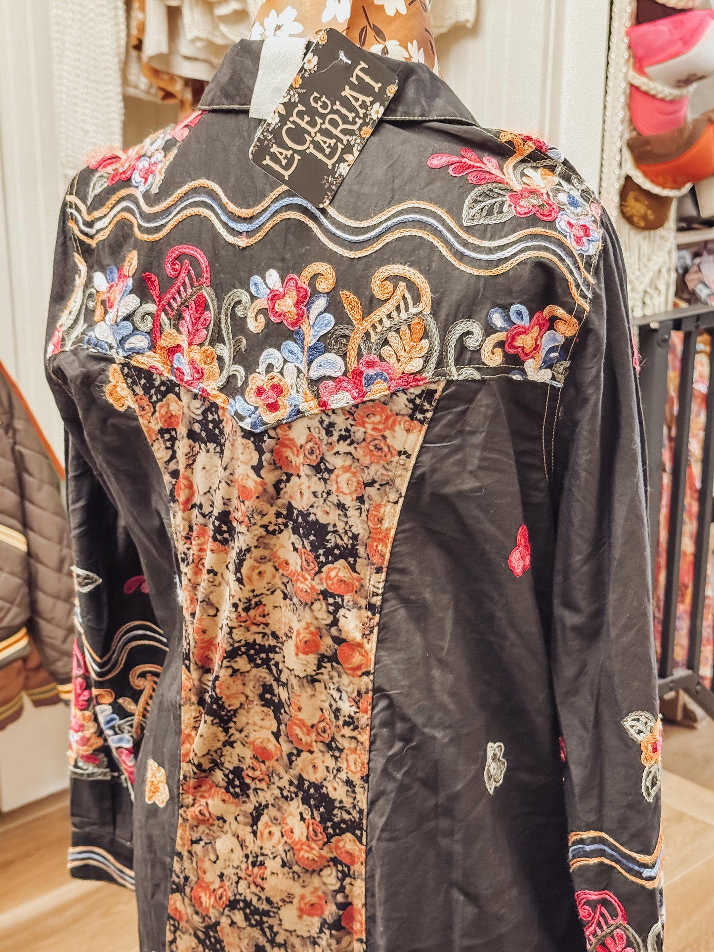 Meadow of flowers embroidered black tunic by Aratta.