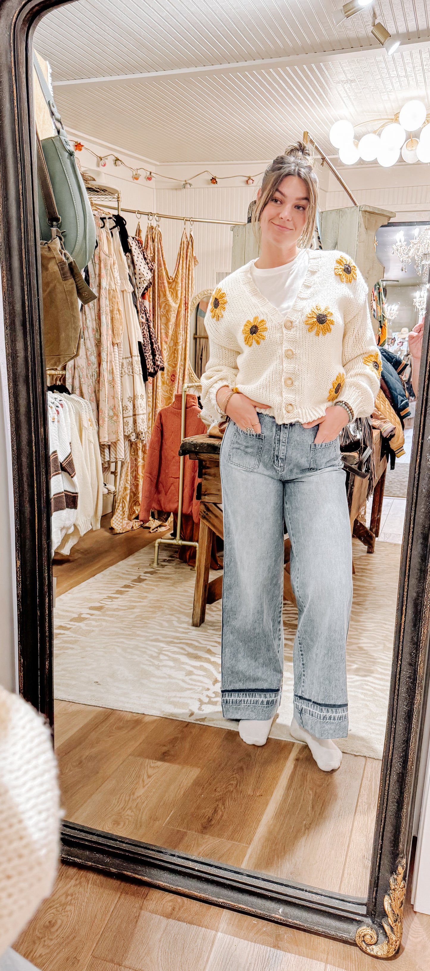 Sunflower embroidered V-neck cardigan.
