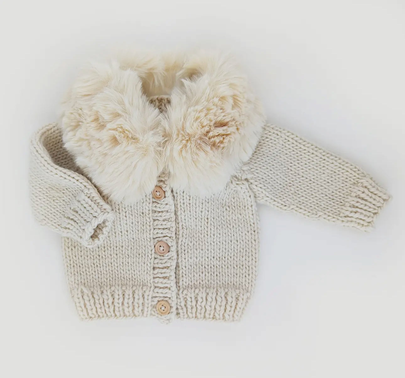 Natural color cardigan with faux fur collar. 18-24 months