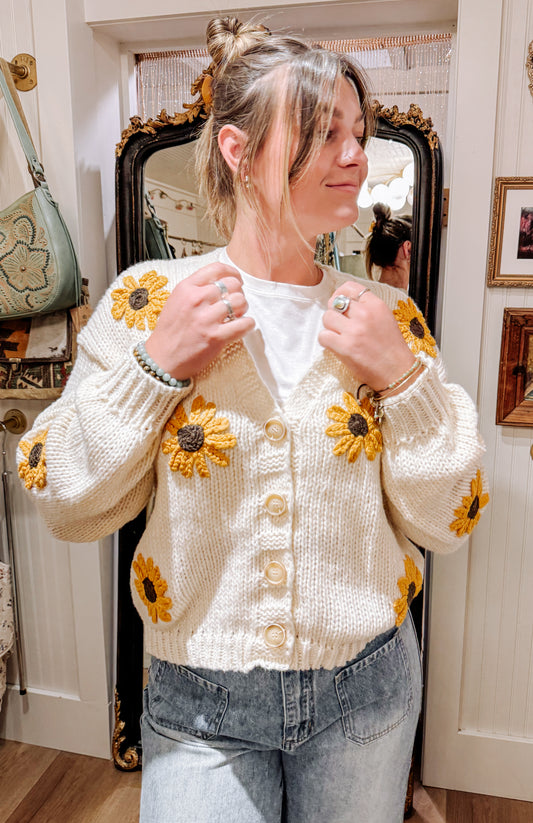 Sunflower embroidered V-neck cardigan.