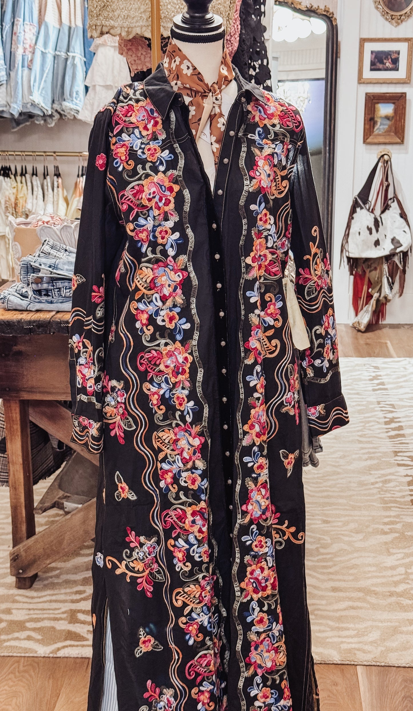 Meadow of flowers embroidered black tunic by Aratta.